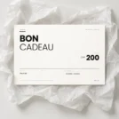 Bon cadeau Inoiv de CHF 200 sur papier de soie blanc