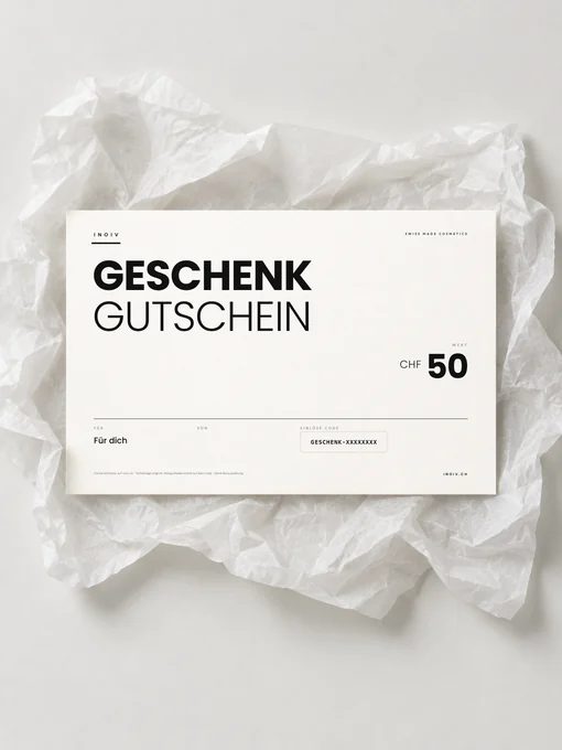 Inoiv Geschenkgutschein über CHF 50 auf weissem Seidenpapier